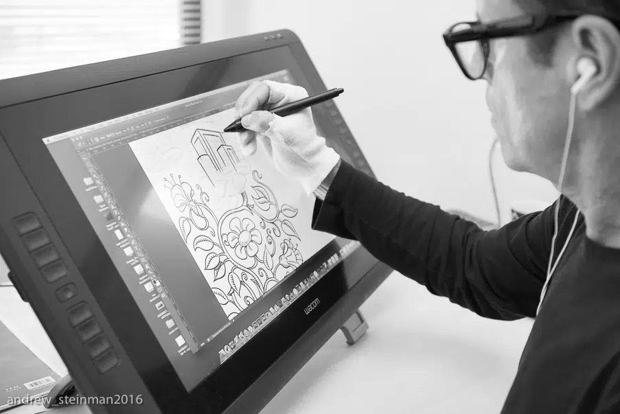 An artist in a whiteboard animation studio