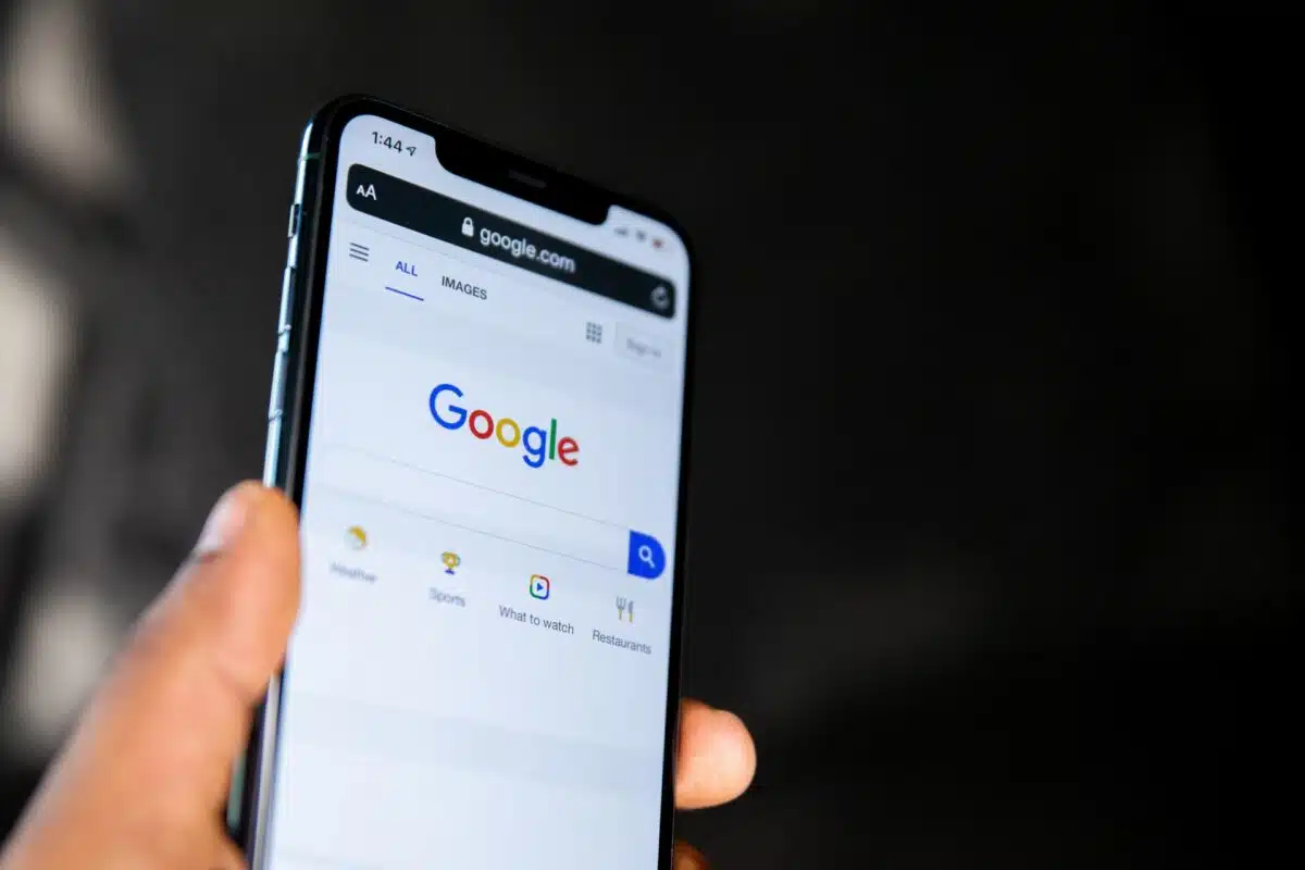 mobile phone displaying Google search page