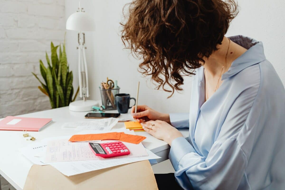 woman using a calculator