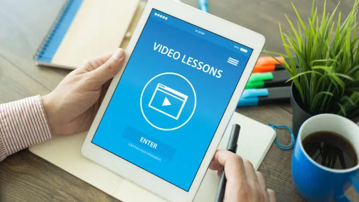 An ipad with a training video