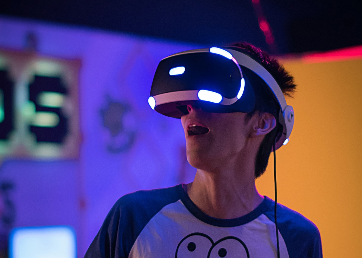 Young man wearing VR goggles